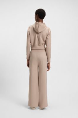 Tracksuit bottoms in piqu&eacute; jersey with monogram tape, Light Beige