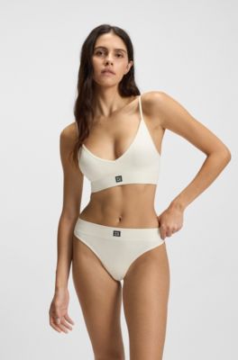 Seamless bralette with ribbed structures and removable padding, White