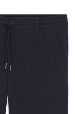 Tapered-fit trousers in a cotton blend, Dark Blue