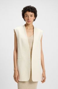 Relaxed-fit sleeveless blazer in Italian cotton-blend bouclé, White