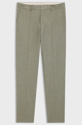 Pantaloni slim fit in tessuto elasticizzato a motivi, Verde