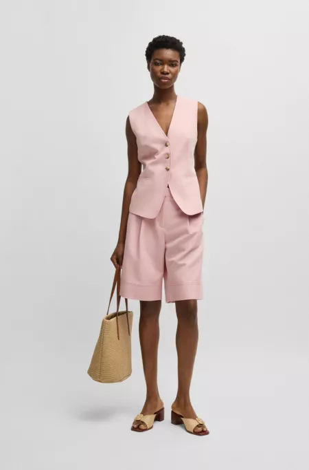 Single-breasted waistcoat with adjustable strap