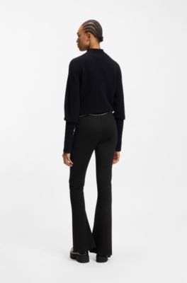 Flared trousers with front slits and chain belt, Black