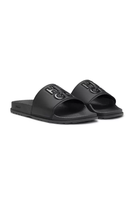Rubber slides with debossed stacked logo