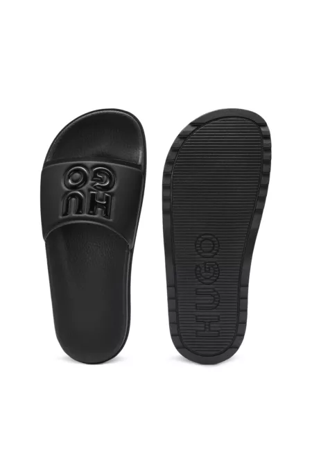 Rubber slides with debossed stacked logo