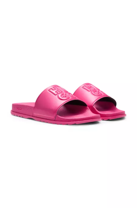Rubber slides with debossed stacked logo