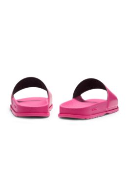 Rubber slides with debossed stacked logo, Pink
