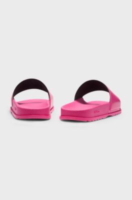 Rubber slides with debossed stacked logo, Pink