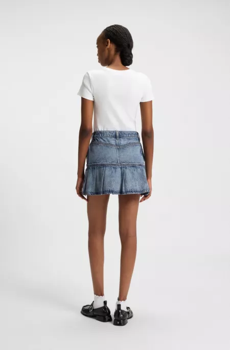 Half-pleated mini skirt in blue rigid denim