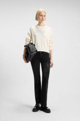 Slim-fit jeans in denim with rhinestone logo slogan, Black