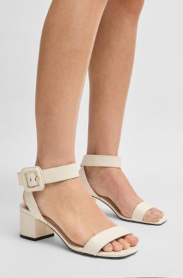 Leather sandals with buckled ankle strap, White