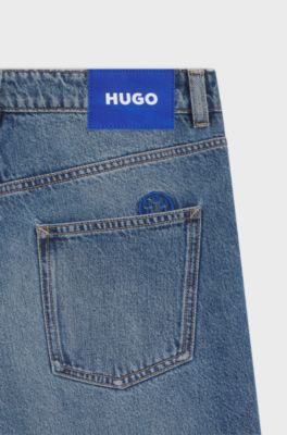Loose-fit jeans in blue denim with Happy HUGO logo, Blue