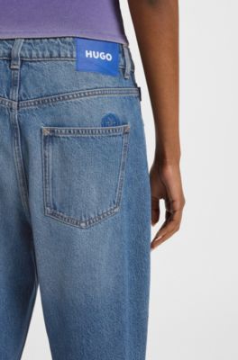 Loose-fit jeans in blue denim with Happy HUGO logo, Blue