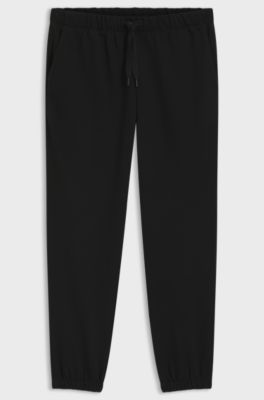 Cotton-terry tracksuit bottoms with logo detail, Black