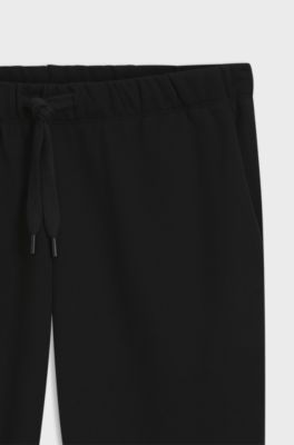 Cotton-terry tracksuit bottoms with logo detail, Black