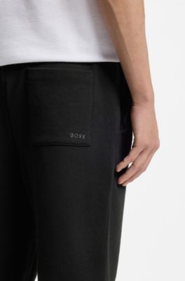 Cotton-terry tracksuit bottoms with logo detail, Black