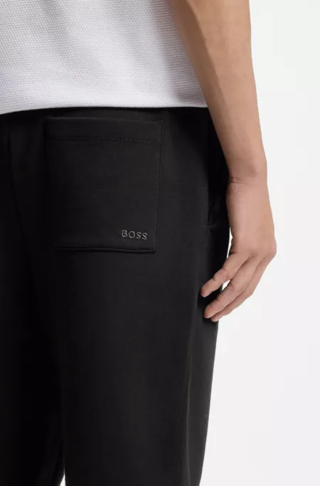Cotton-terry tracksuit bottoms with logo detail