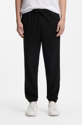 Cotton-terry tracksuit bottoms with logo detail, Black