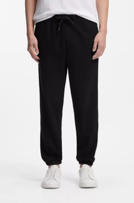 Cotton-terry tracksuit bottoms with logo detail