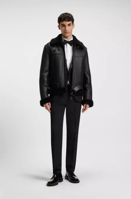 Leather jacket with shearling trims