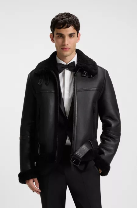 Leather jacket with shearling trims