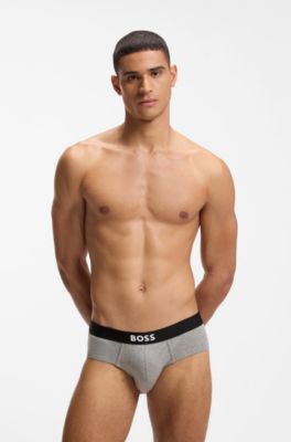 Paquete de tres calzoncillos slip de tiro bajo en algod&oacute;n el&aacute;stico, Blanco / Gris / Negro