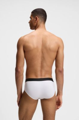 Paquete de tres calzoncillos slip de tiro bajo en algod&oacute;n el&aacute;stico, Blanco / Gris / Negro