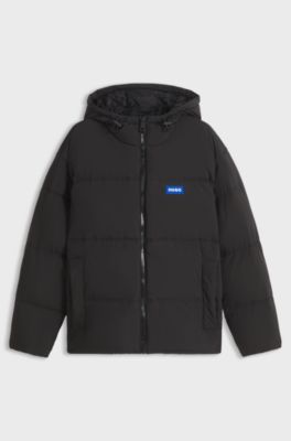 Wasserabweisende Relaxed-Fit Jacke mit Logo-Badge, Schwarz