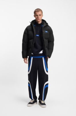 Water-repellent padded jacket with blue logo label, Black