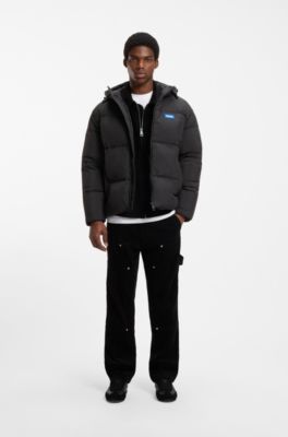 Wasserabweisende Relaxed-Fit Jacke mit Logo-Badge, Schwarz