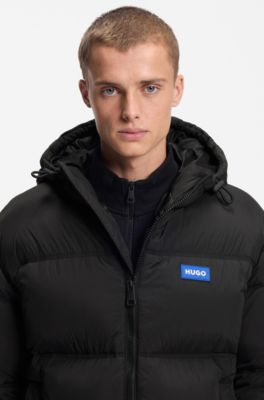 Chaqueta acolchada repelente al agua con etiqueta con logo azul, Negro