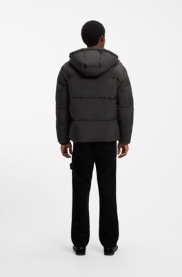 Wasserabweisende Relaxed-Fit Jacke mit Logo-Badge, Schwarz
