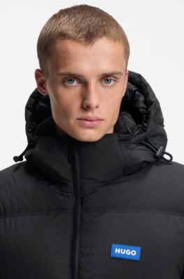 Veste matelass&eacute;e d&eacute;perlante Relaxed avec capuche ajustable, Noir
