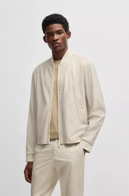 Water-repellent packable jacket with two-way zip