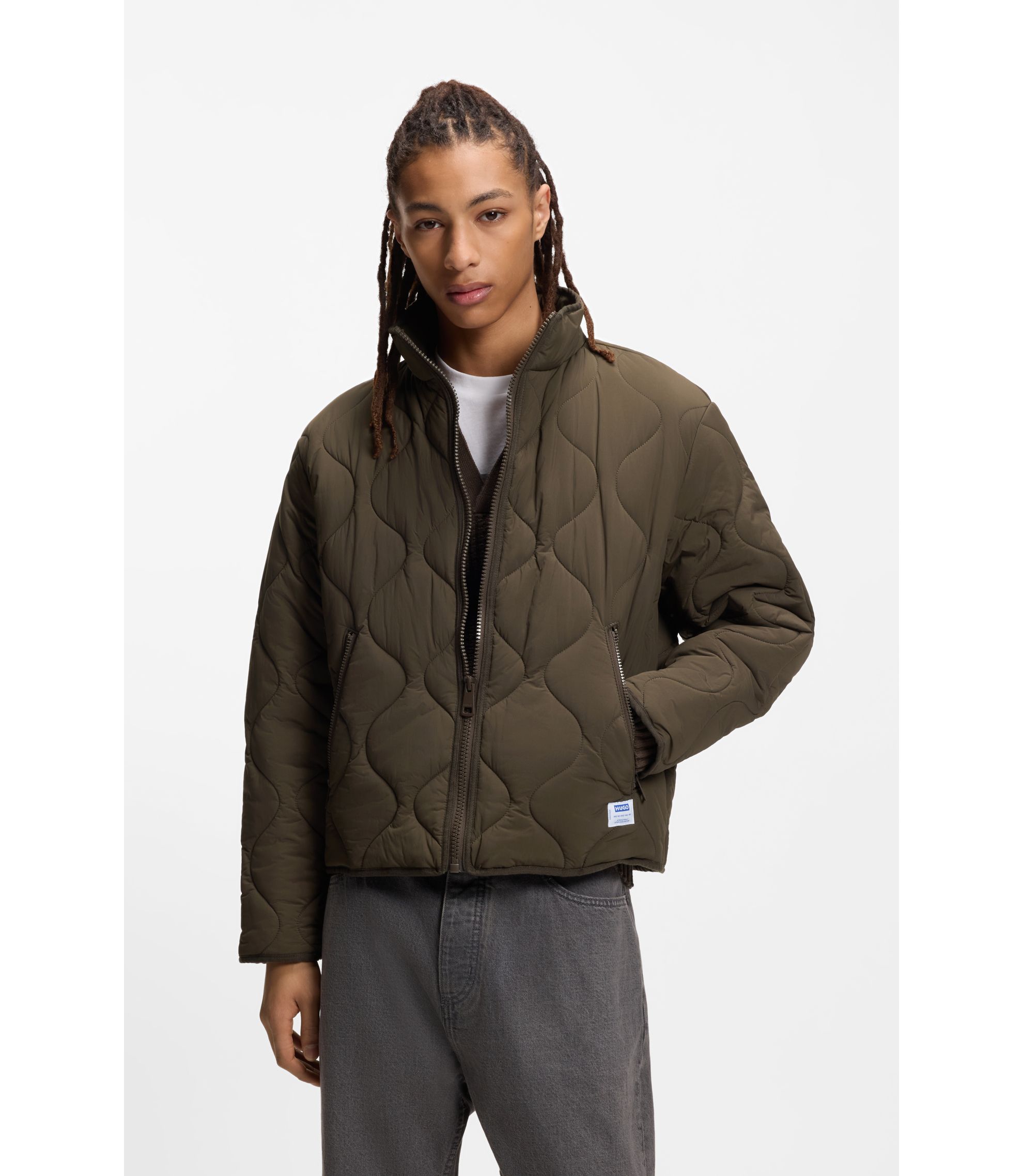 Wasserabweisende Jacke mit geschwungenen Absteppungen