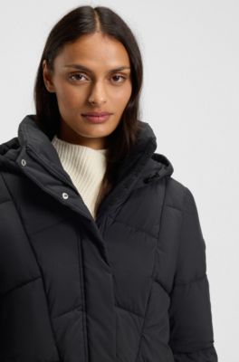 Wattierte Jacke mit Kapuze und Paspeln, Schwarz