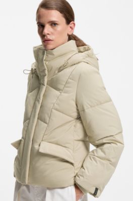 Wattierte Jacke mit Kapuze und Paspeln, Hellbeige