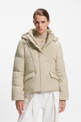 Wattierte Jacke mit Kapuze und Paspeln, Hellbeige