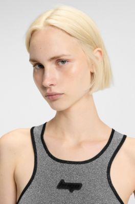 Jurk van glinsterende jersey met racerback en silicone logopatch, Zilver