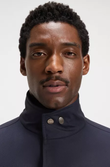 Coat with concealed closure