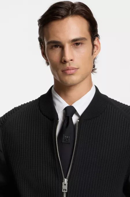 Knitted jacket with contrast sleeves