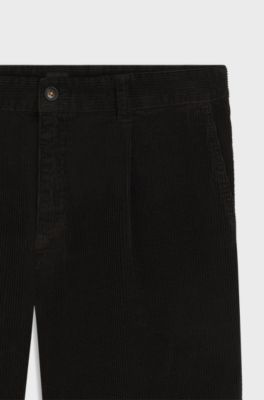 Pantalones tapered fit en pana de algod&oacute;n el&aacute;stico, Negro