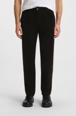 Pantalon Tapered en velours c&ocirc;tel&eacute; de coton stretch, Noir