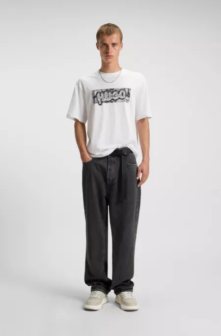 Baggy-fit jeans in black denim with faded logo