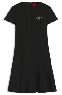 A-line dress with godet inserts and bow brooch, Black