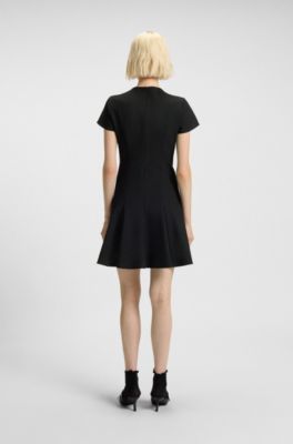 A-line dress with godet inserts and bow brooch, Black