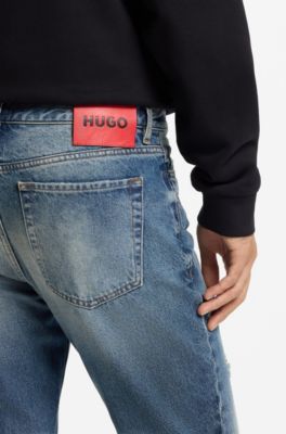 Tapered-fit jeans in distressed blue denim, Blue