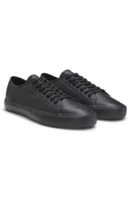 Low-top trainers in grained faux leather, Black