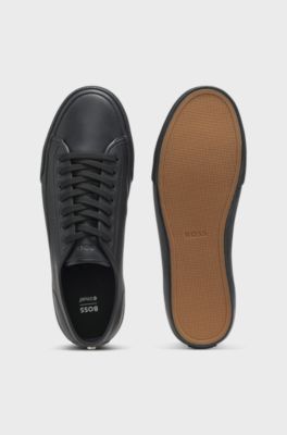 Low-top trainers in grained faux leather, Black