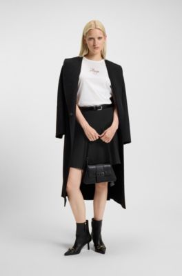 Jupe courte &agrave; la coupe &eacute;vas&eacute;e avec empi&egrave;cements godets, Noir